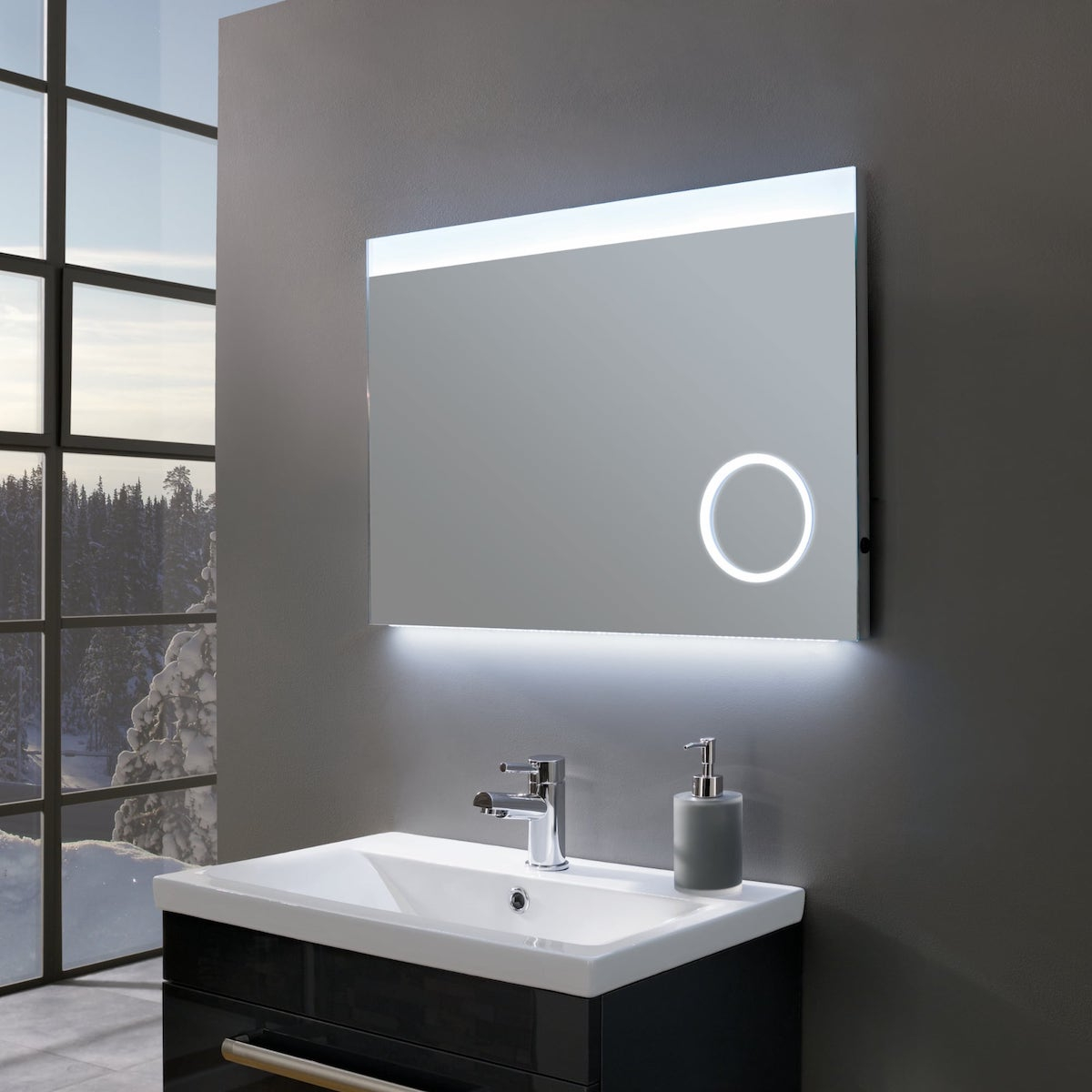 Bathroom cabinet with magnifying outlet mirror