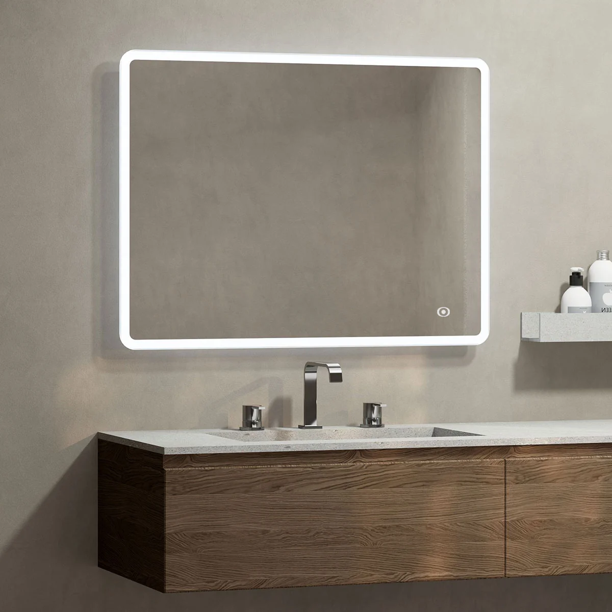 A rectangular mirror with a thin white LED light frame is mounted on a beige wall above a bathroom sink.